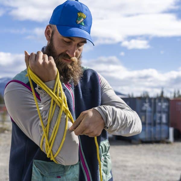 Canadian Outdoor Academy instructor coiling rope