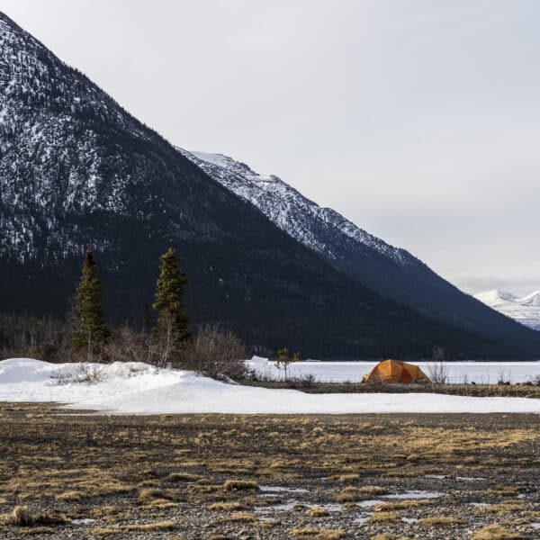 Winter camping by a lake